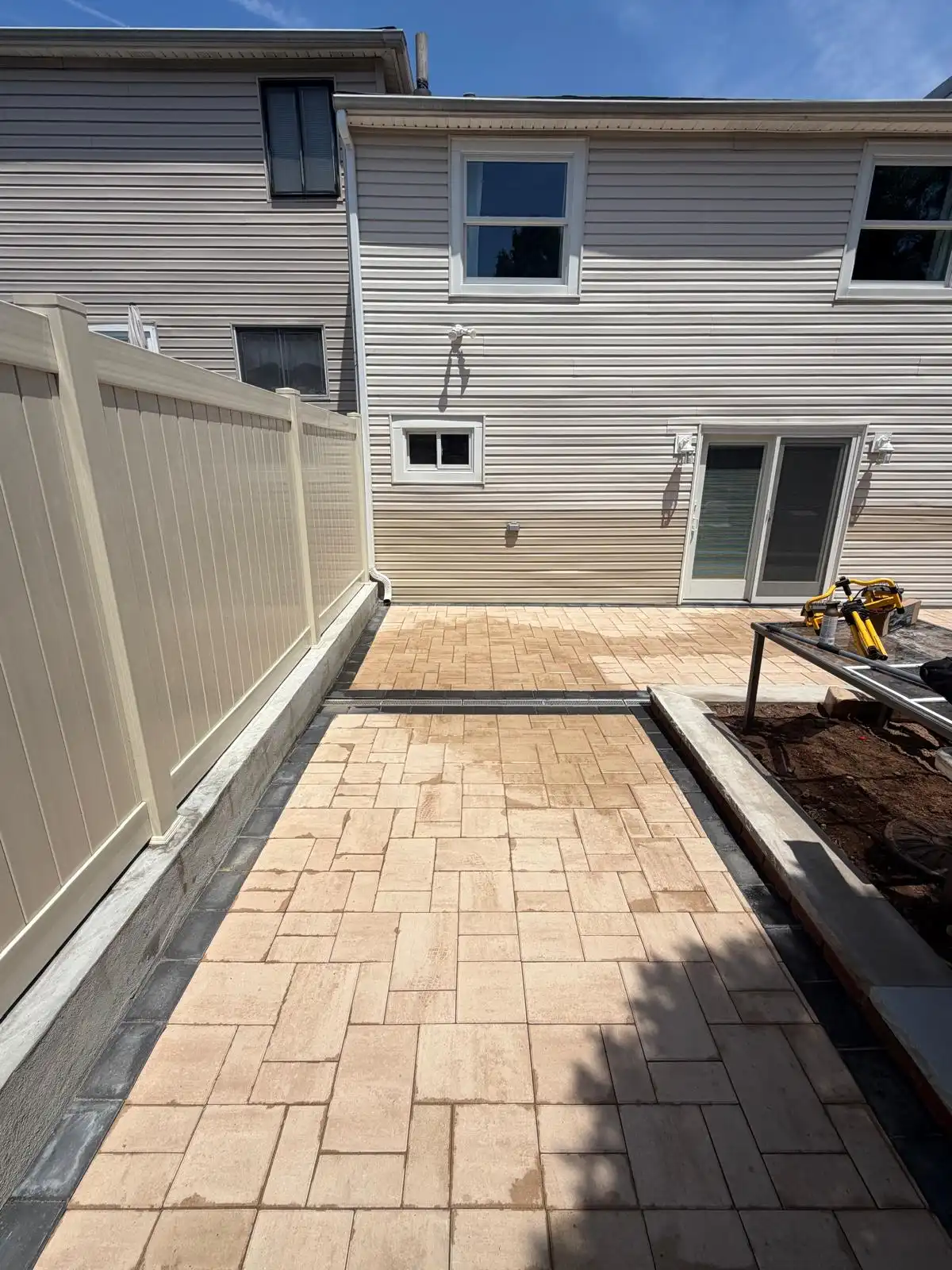 Backyard paver patio with PVC fence — Emerson Hill, Staten Island