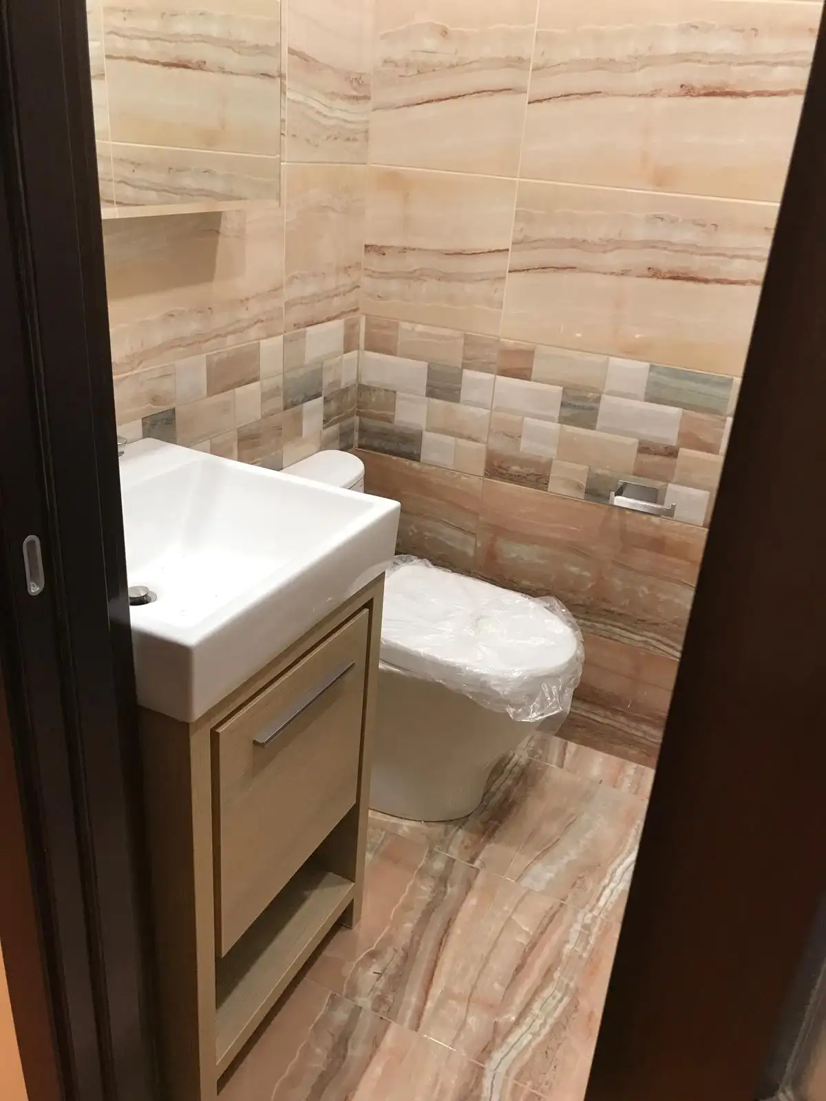 Bathroom vanity and porcelain tile walls — Brighton Beach, Brooklyn