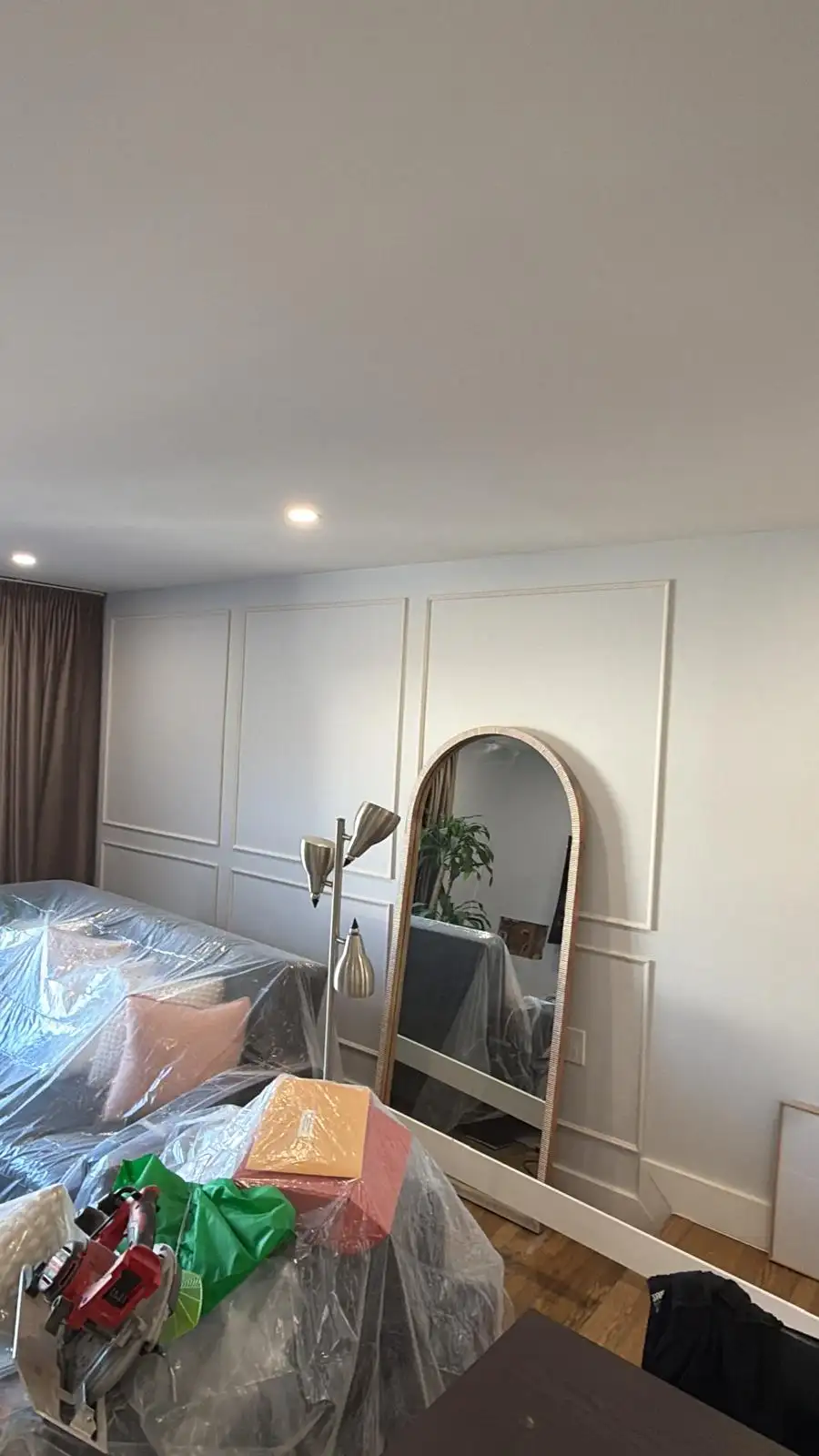 Bedroom picture-frame wall molding with arched mirror — Bath Beach, Brooklyn