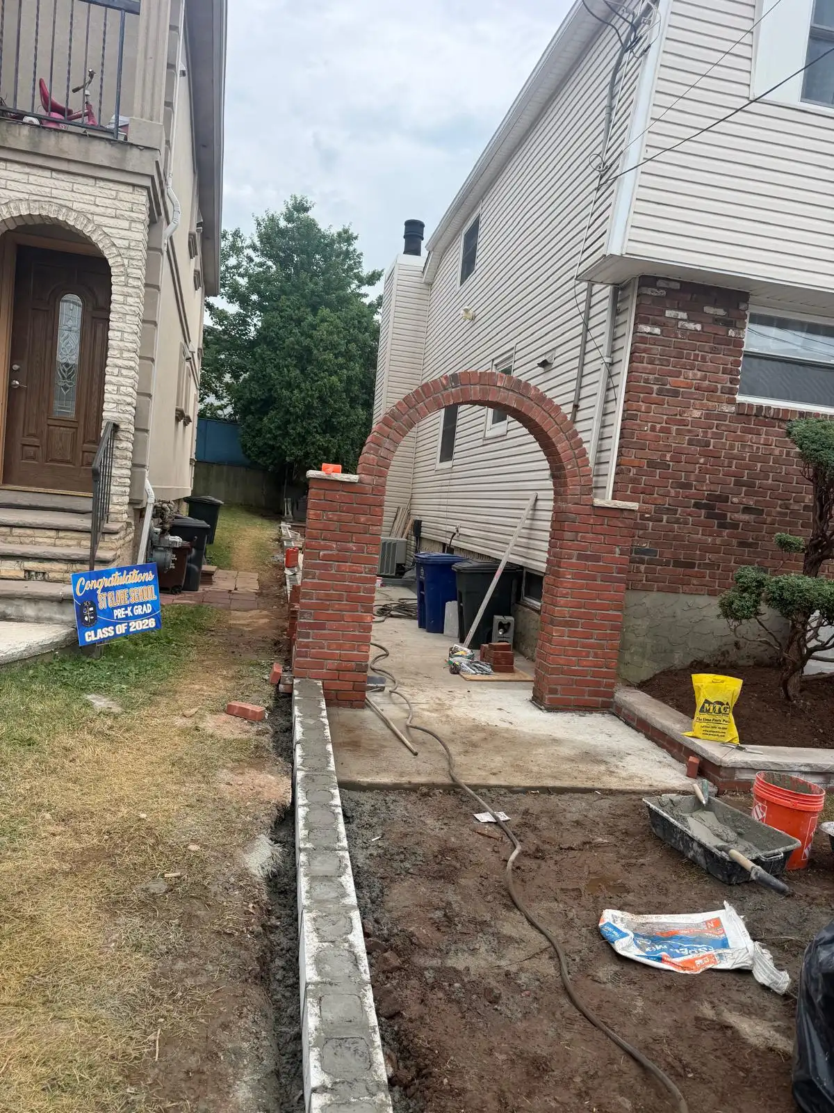 Brick arch construction at front yard — Emerson Hill, Staten Island