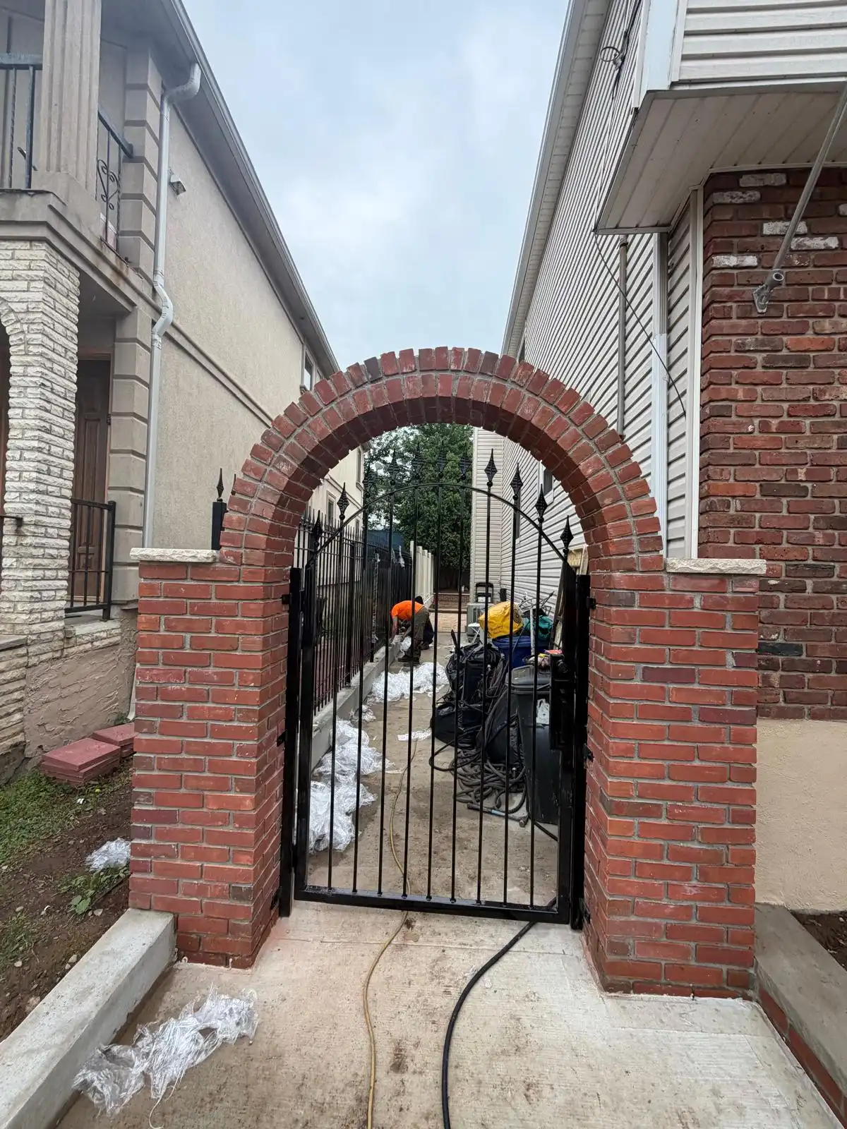 Brick arch with wrought iron gate — Emerson Hill, Staten Island