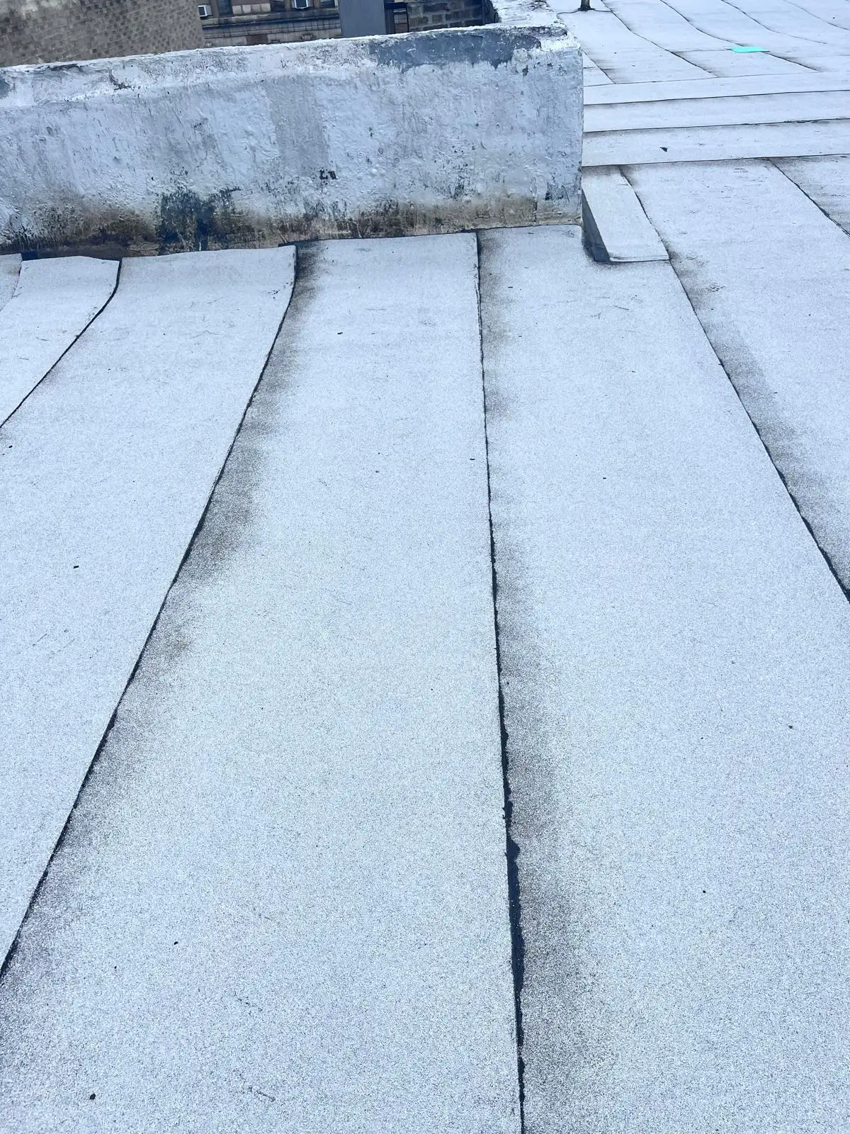 Bulkhead with new roofing — Washington Heights, Manhattan