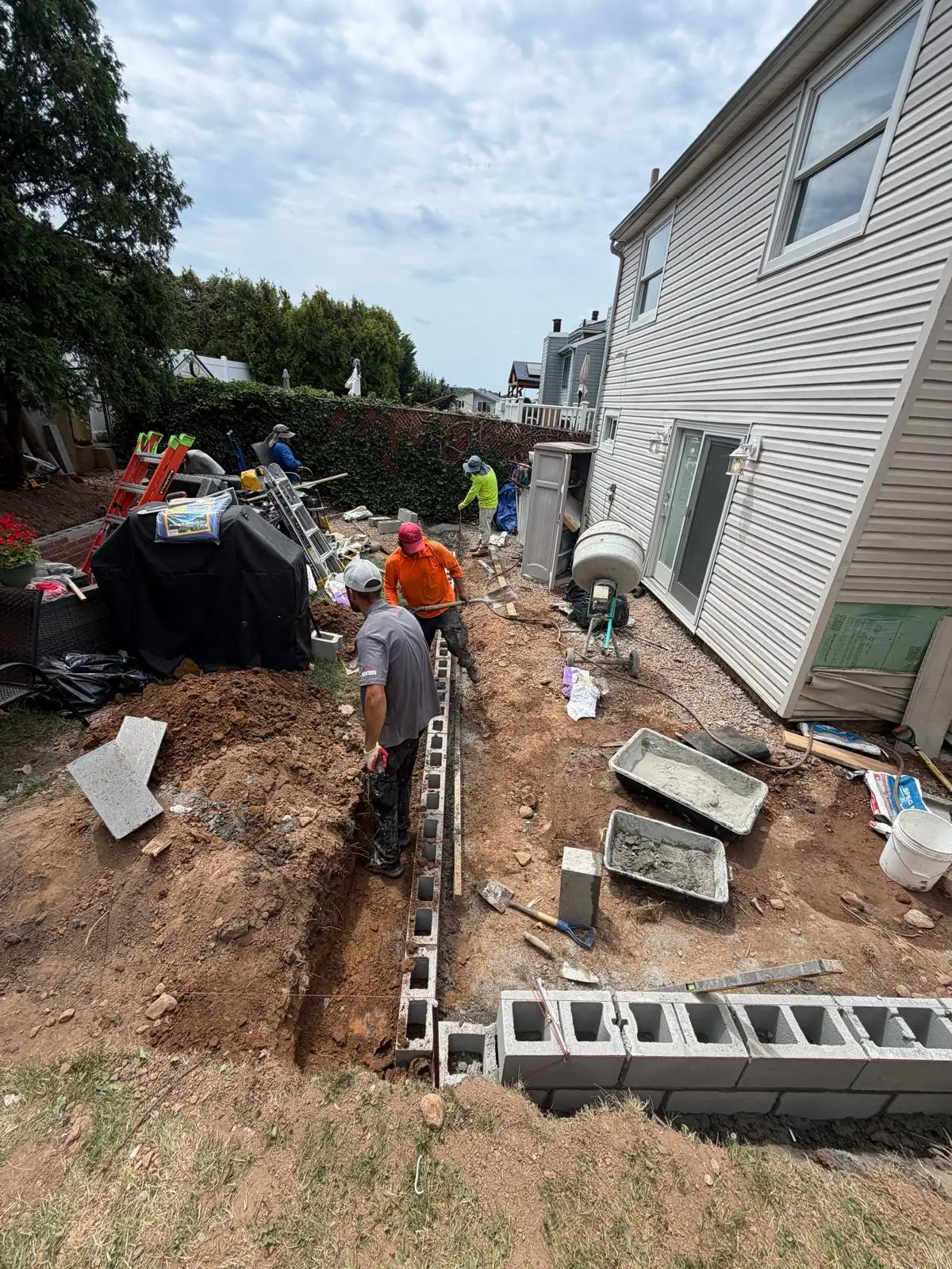 Crew building backyard retaining wall — Emerson Hill, Staten Island