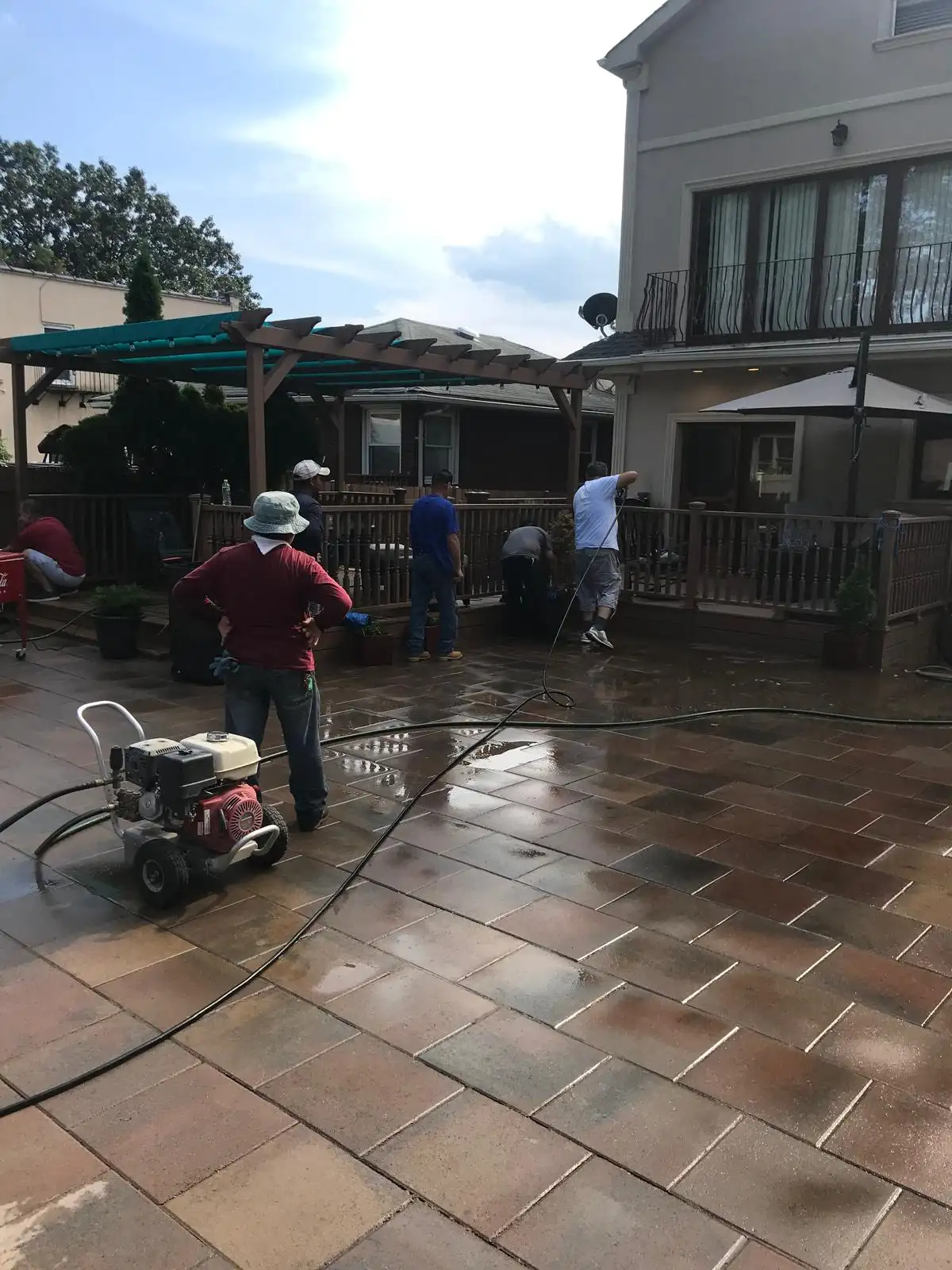 Crew cleaning new pavers — Arrochar, Staten Island