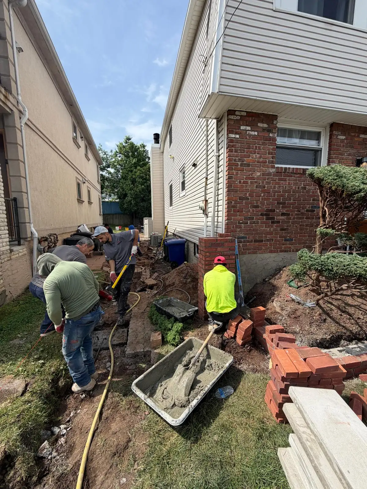 Crew excavating front yard — Emerson Hill, Staten Island