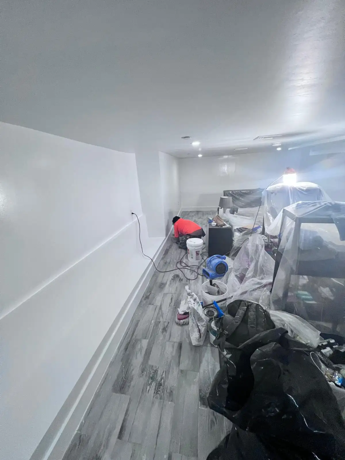 Crew finishing drywall — Bedford-Stuyvesant, Brooklyn