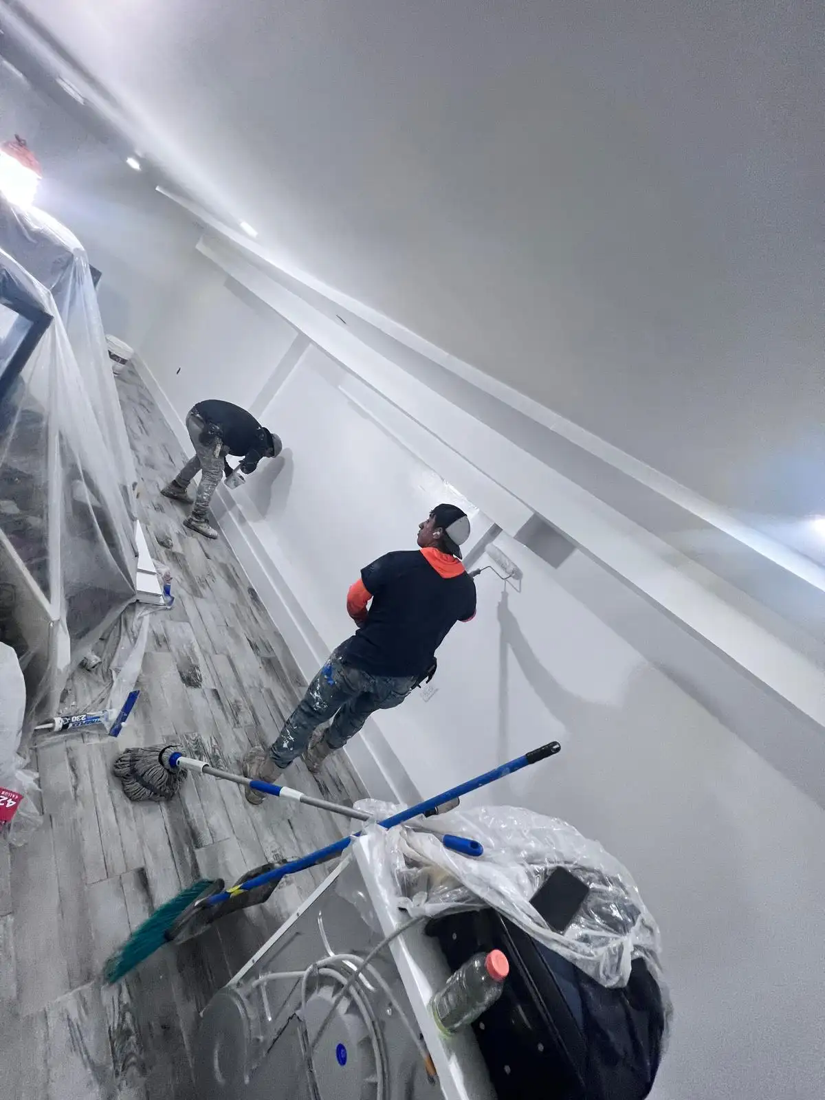 Crew taping and plastering — Bedford-Stuyvesant, Brooklyn