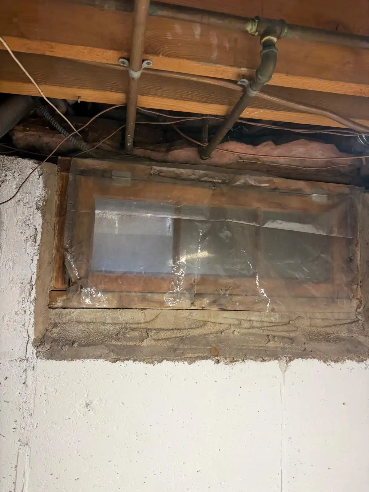 Deteriorated basement window framing — Eltingville, Staten Island