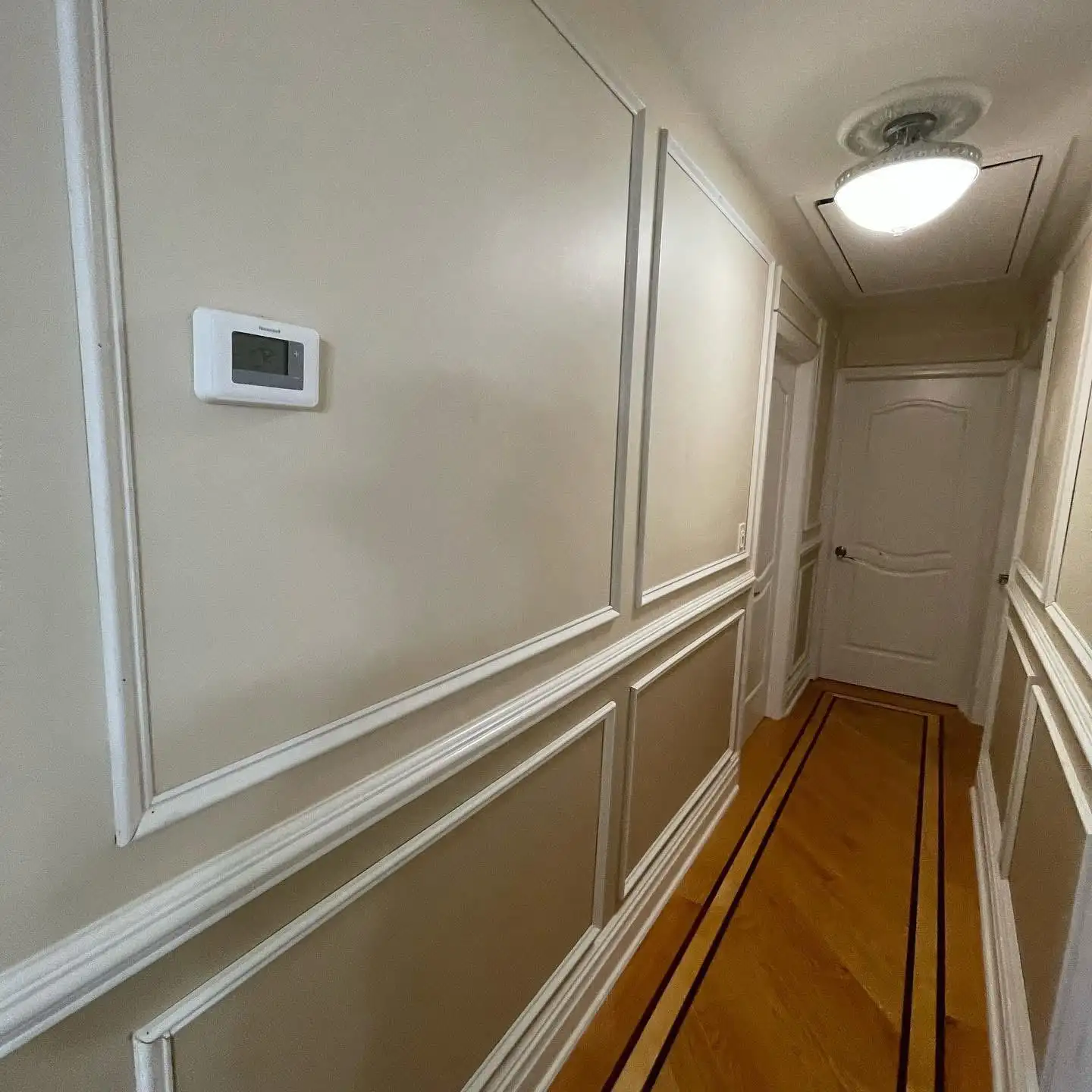Hallway picture-frame wall molding and inlaid floor — Arrochar, Staten Island