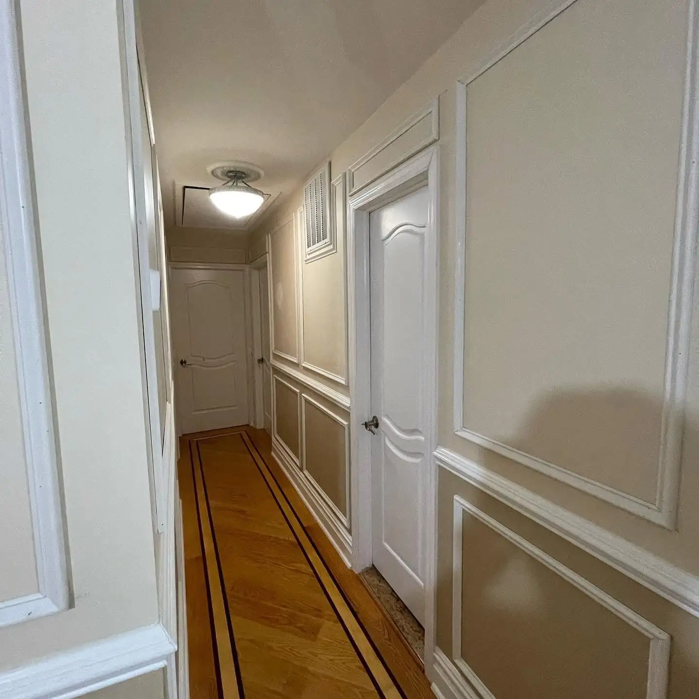 Hallway wainscoting and hardwood border inlay — Arrochar, Staten Island