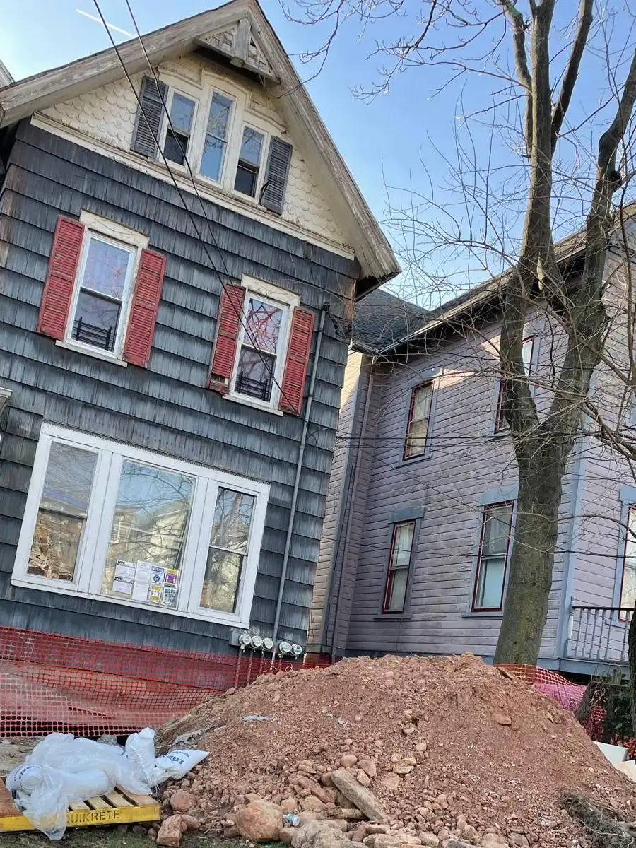 House facade after foundation waterproofing — Stapleton, Staten Island