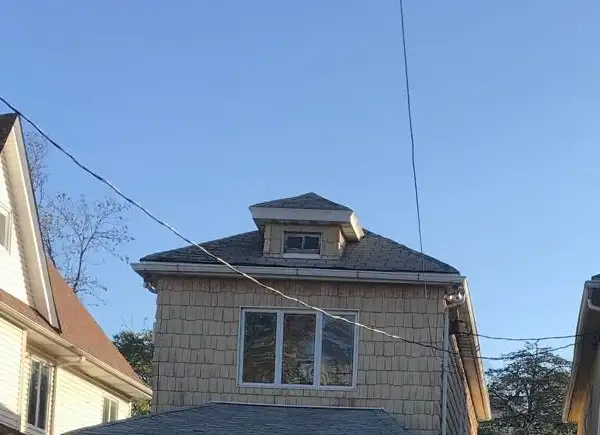 House roof at the start of the shingle overlay — Sheepshead Bay, Brooklyn
