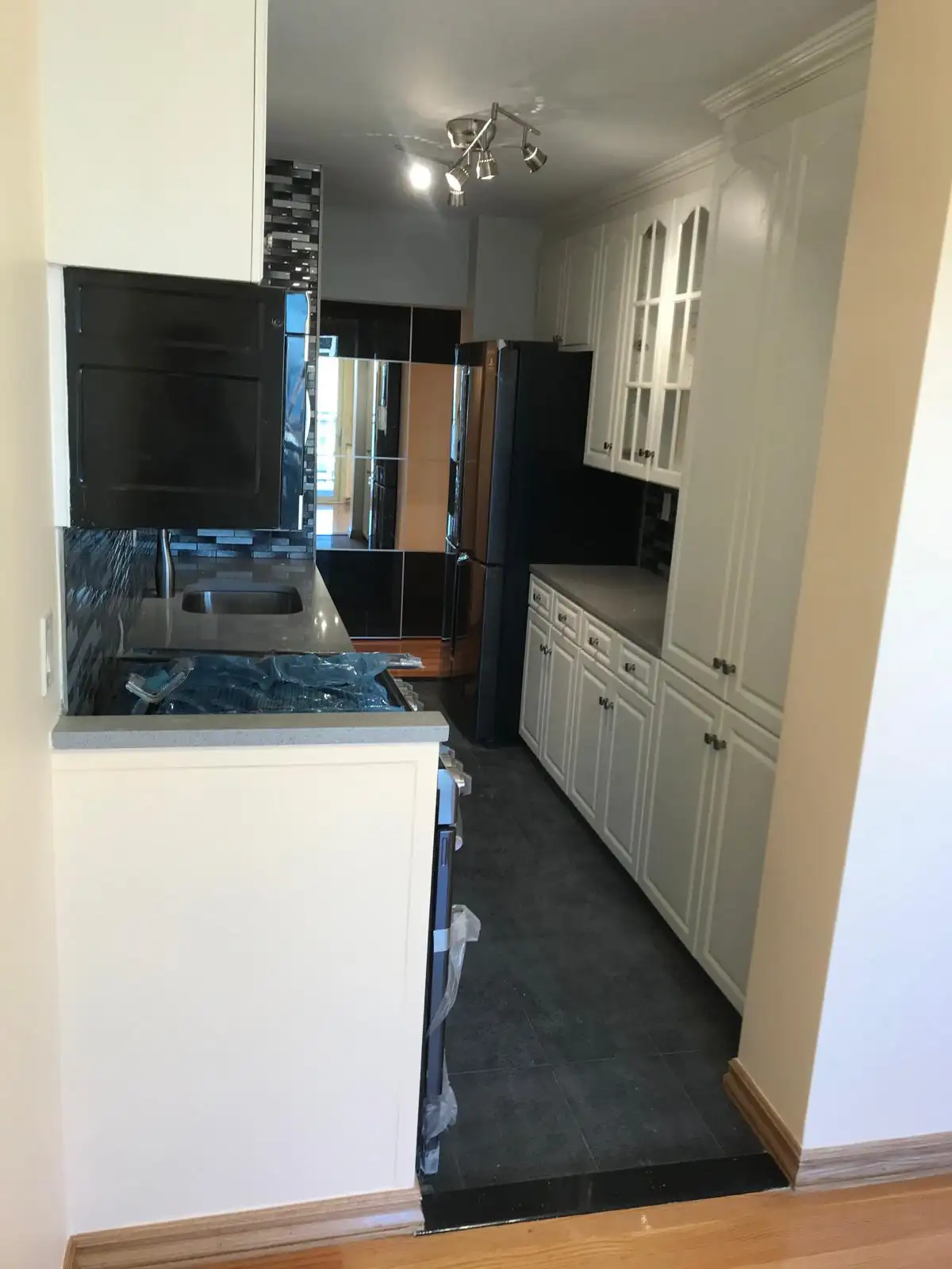 Kitchen with mosaic backsplash — Brighton Beach, Brooklyn