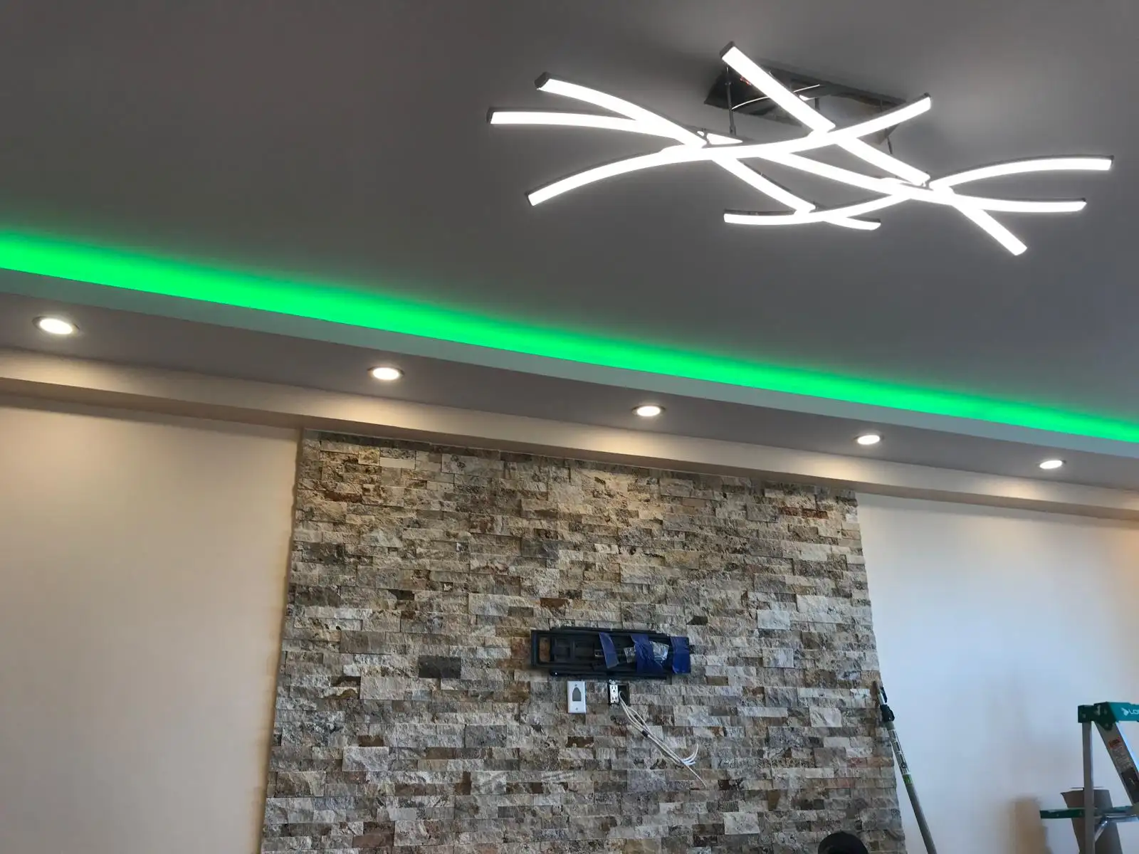 Living room stone accent wall with LED cove lighting — Brighton Beach, Brooklyn