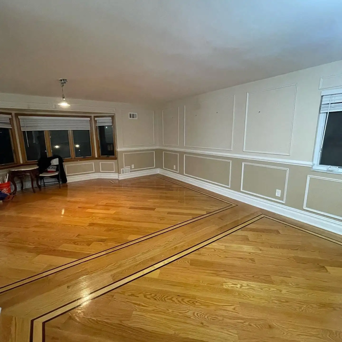 Living room wainscoting and refinished floor with border inlay — Arrochar, Staten Island