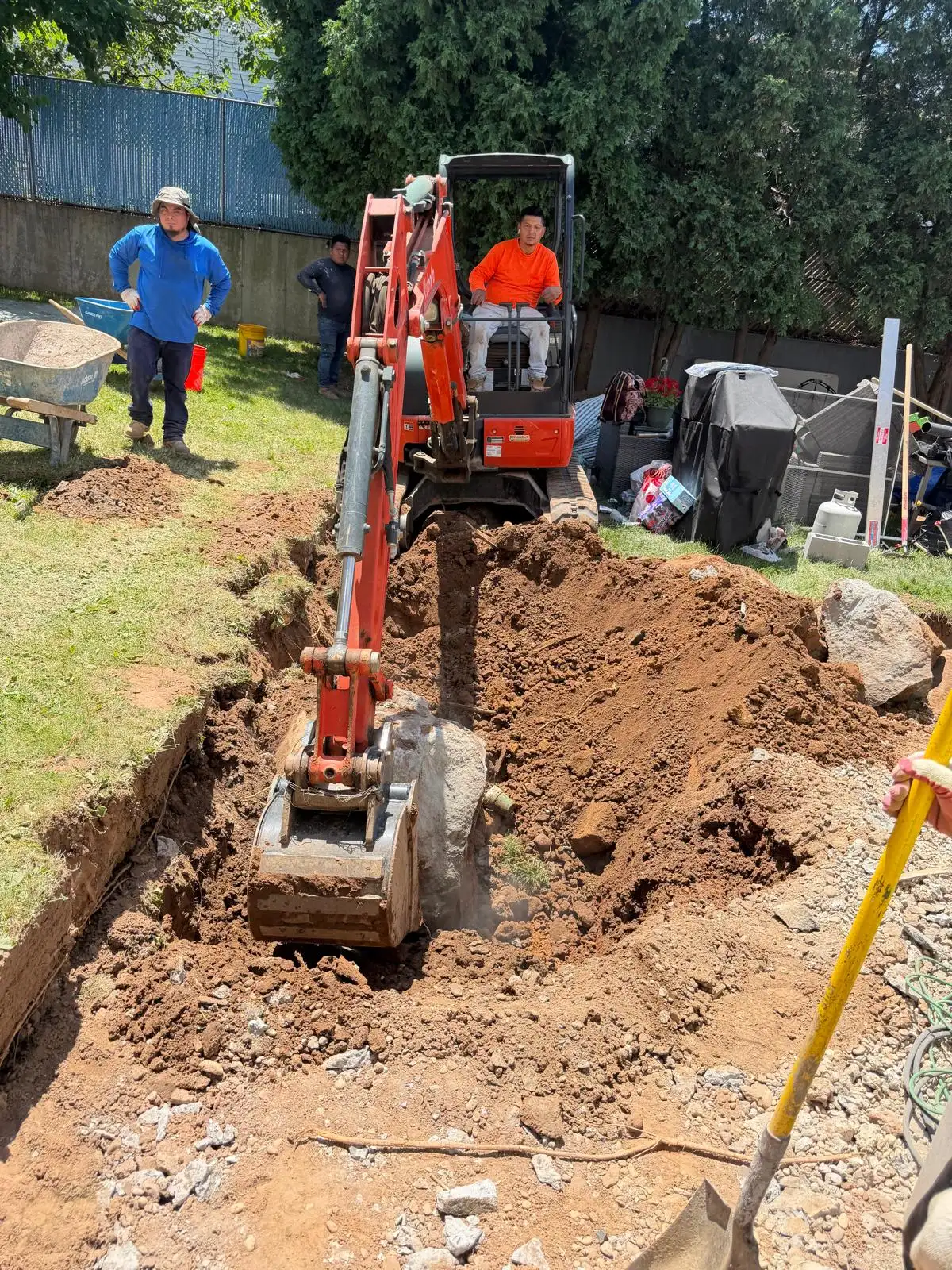 Mini excavator digging footing — Emerson Hill, Staten Island