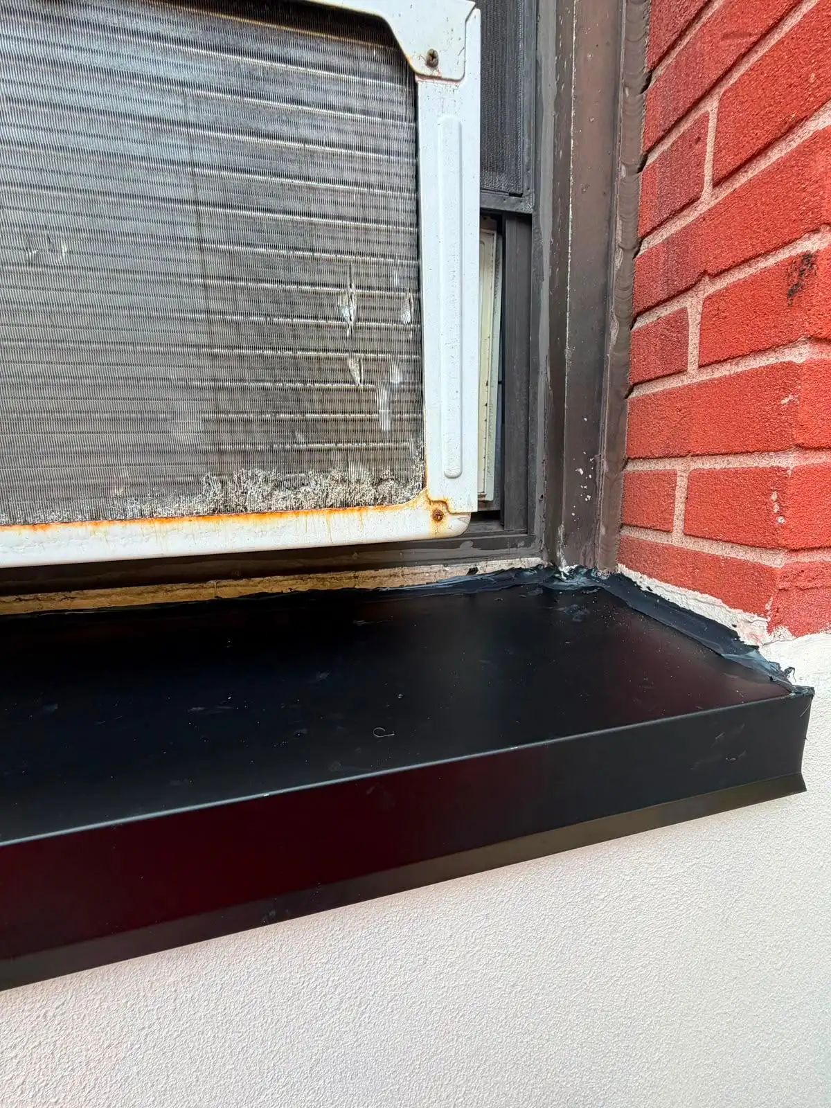 New black metal windowsill installed — Upper West Side, Manhattan