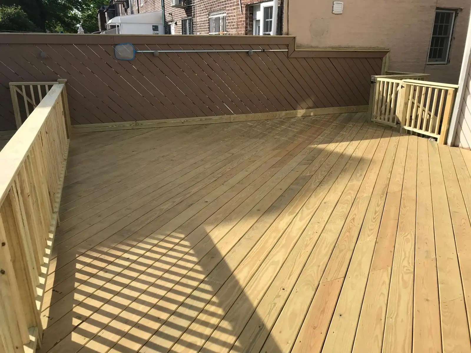New deck boards and railing — Dyker Heights, Brooklyn