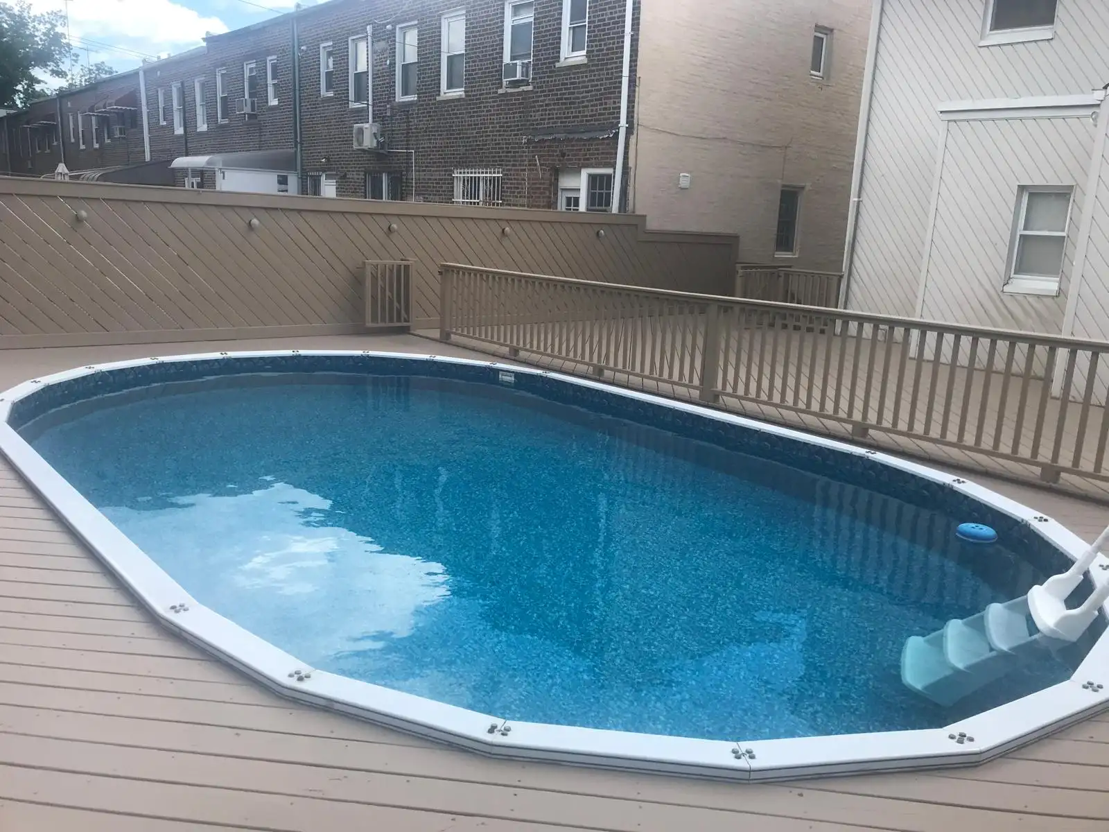 New deck surrounding pool — Dyker Heights, Brooklyn