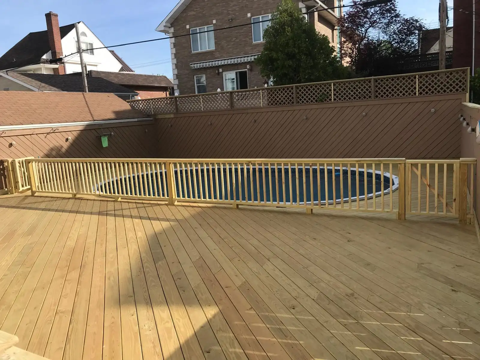 New deck with pool railing — Dyker Heights, Brooklyn