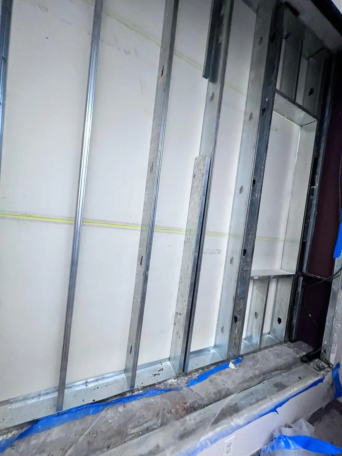 New metal framing in window opening — Crown Heights, Brooklyn