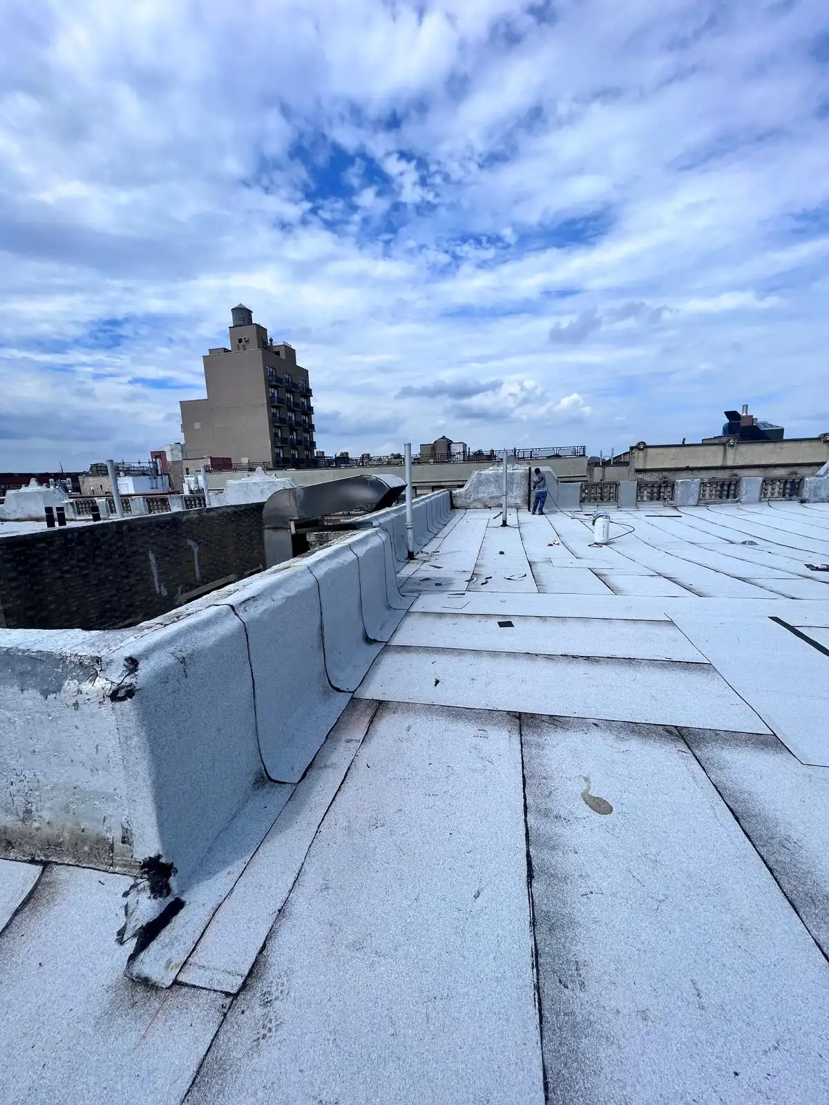 New roof along parapet wall — Washington Heights, Manhattan