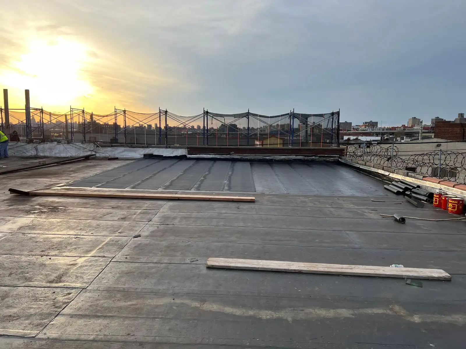 New roofing with sunset view — Hunts Point, Bronx