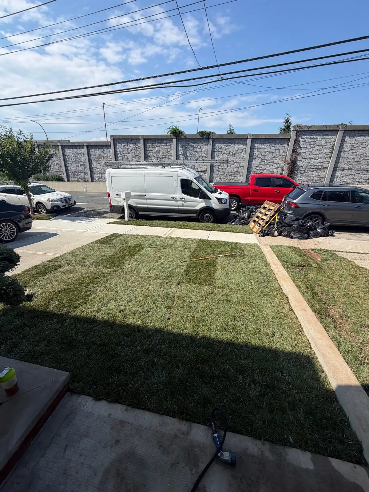 New sod lawn with concrete border — Emerson Hill, Staten Island