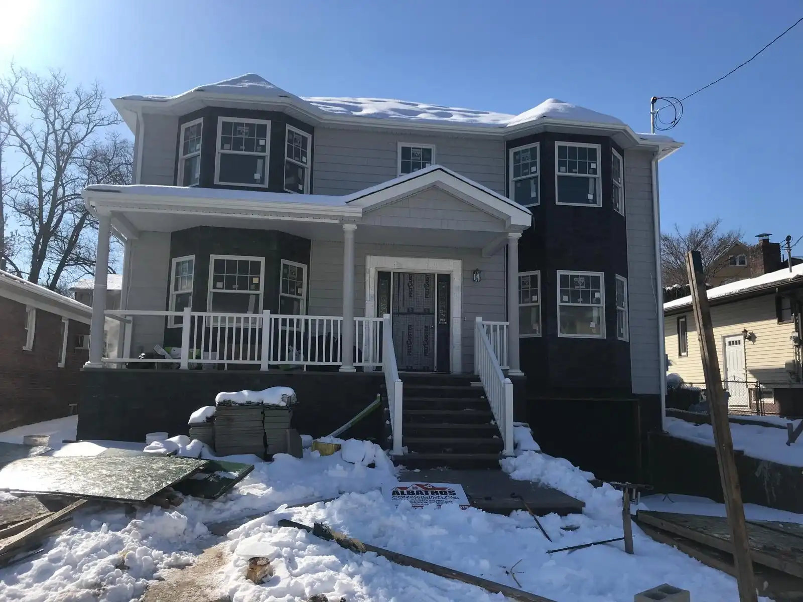 New two-story home with porch railings — Castleton Corners, Staten Island