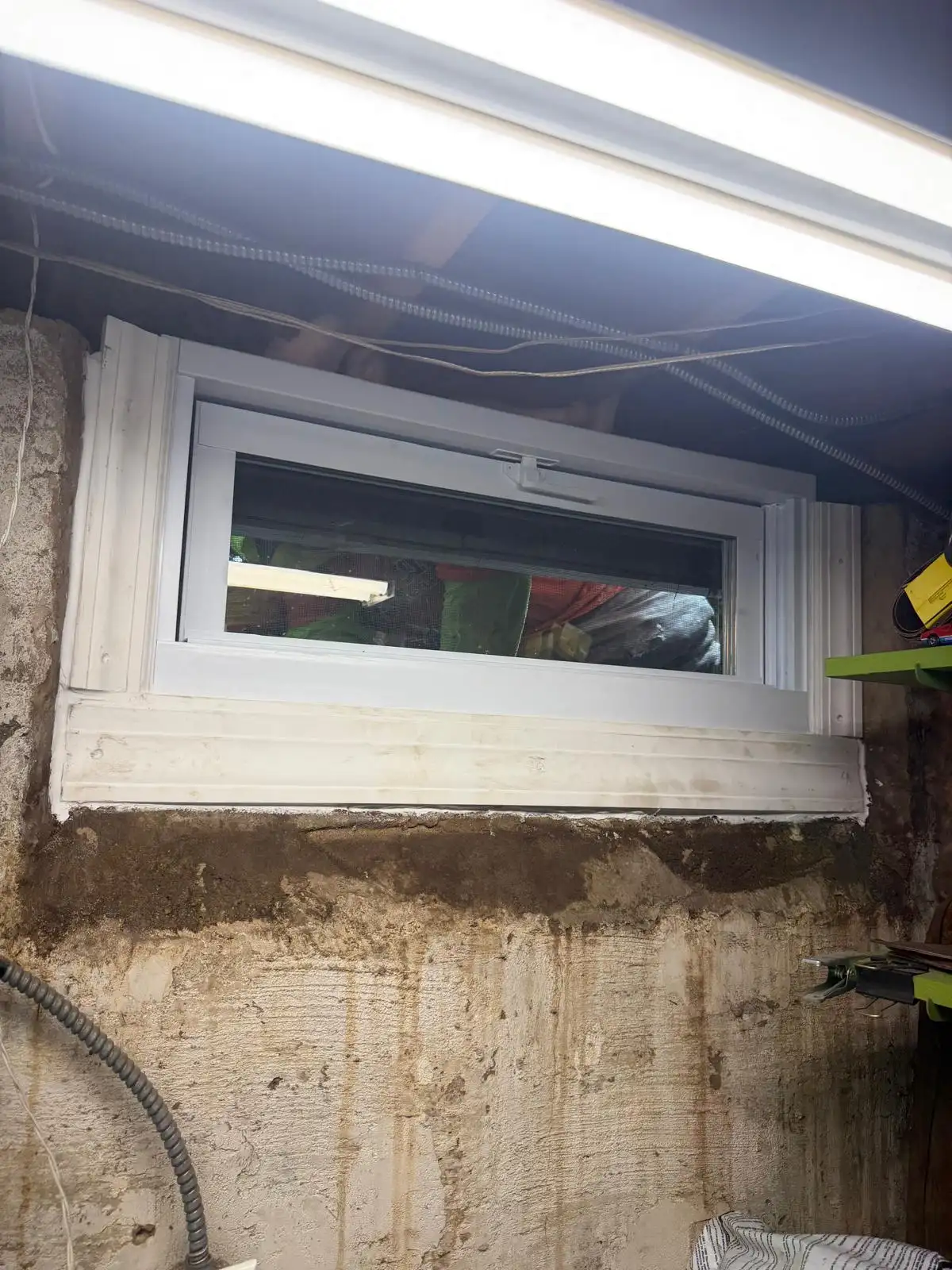 New white basement window with new framing — Eltingville, Staten Island
