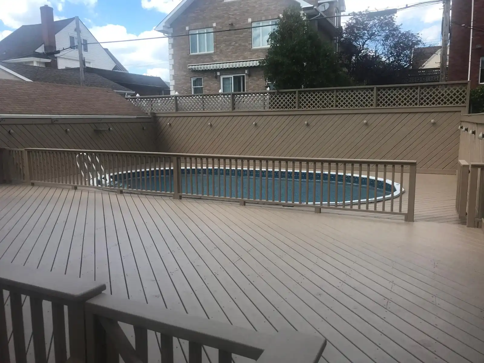Painted deck and pool fence — Dyker Heights, Brooklyn