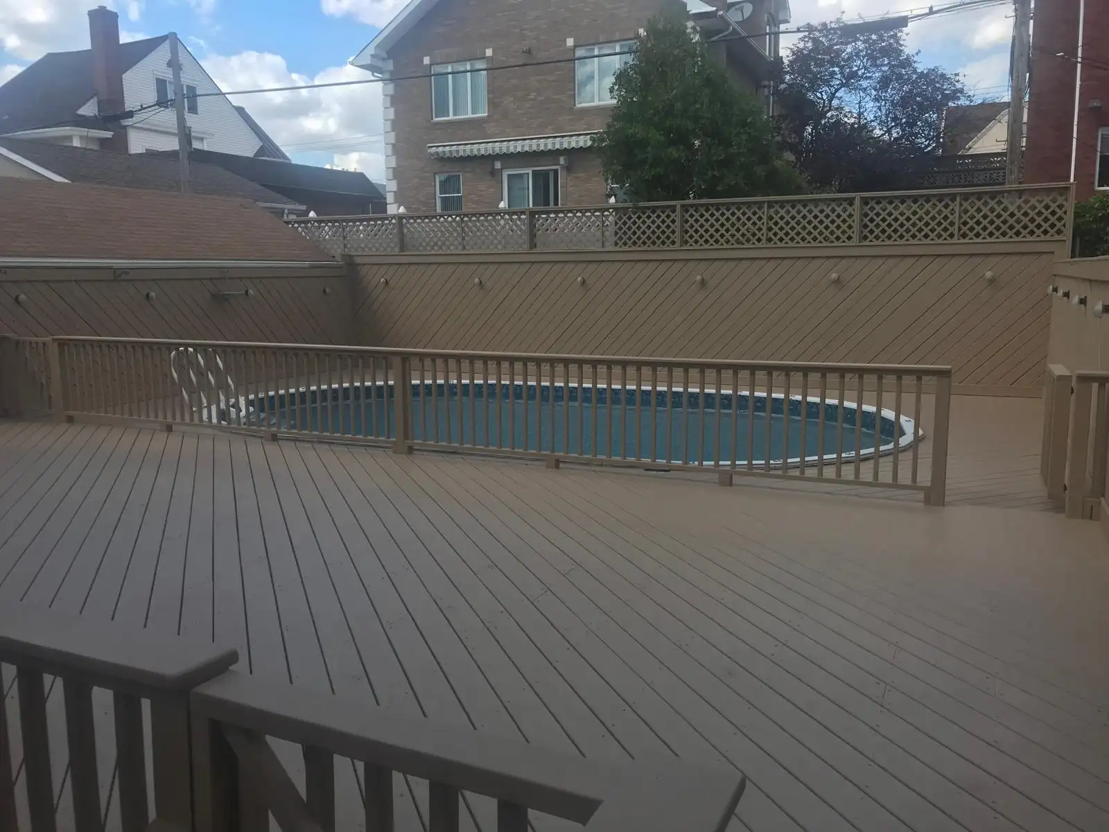 Painted deck with pool railing — Dyker Heights, Brooklyn