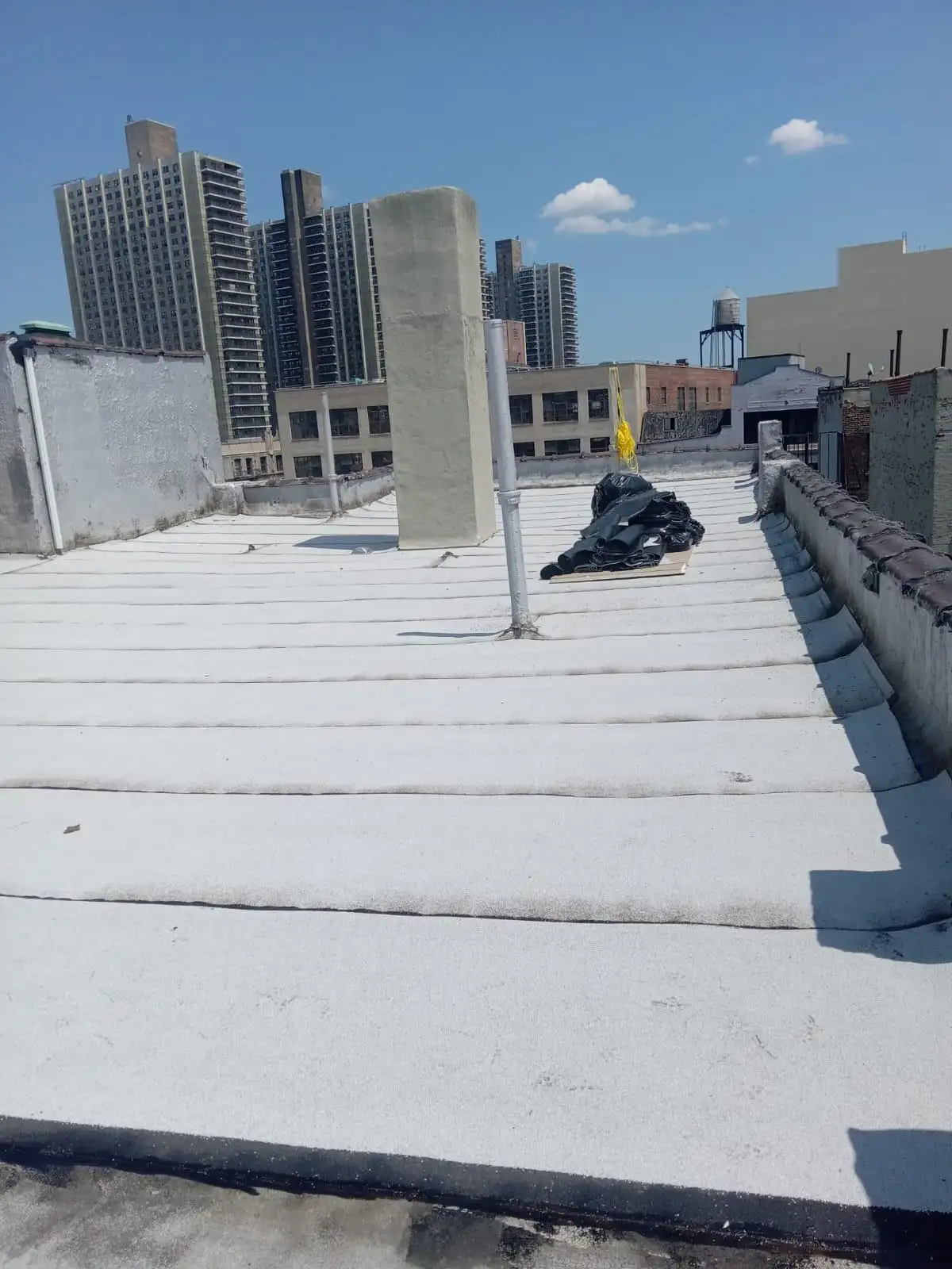 Parapet wall with new roofing — Washington Heights, Manhattan