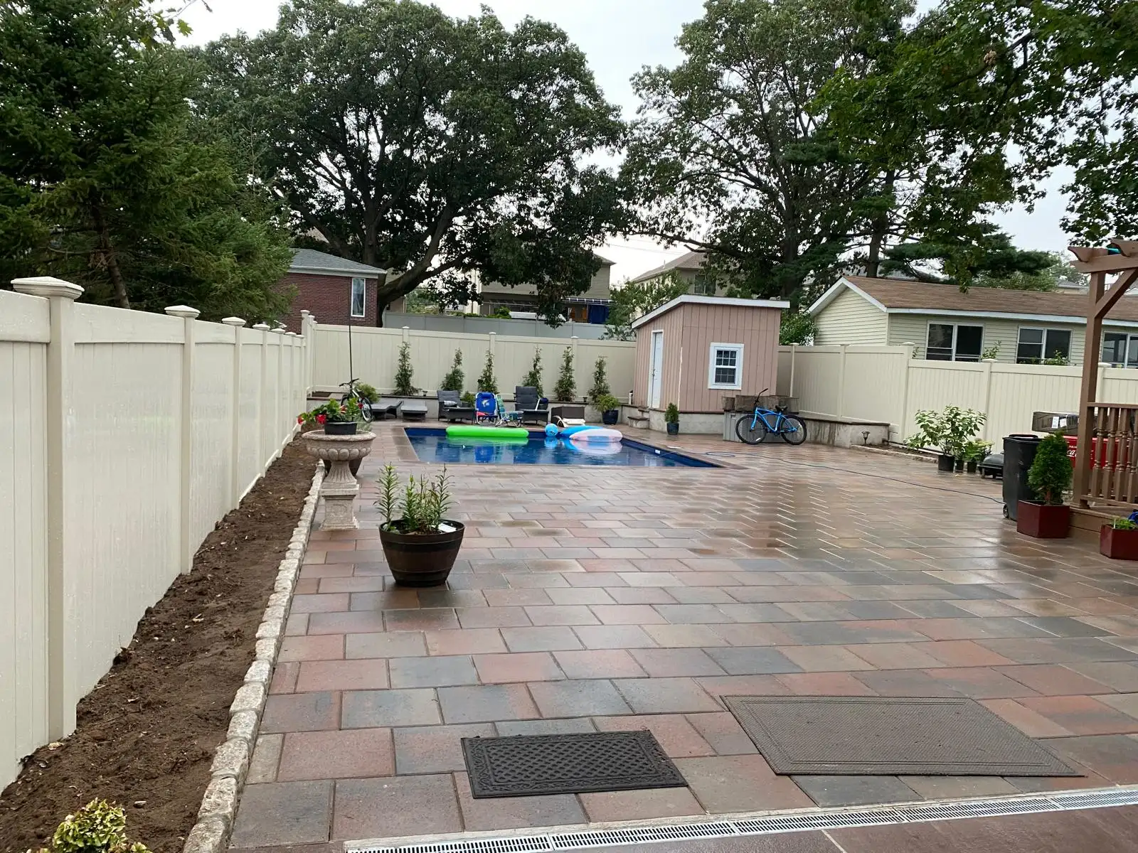 Paver patio and PVC privacy fence — Arrochar, Staten Island