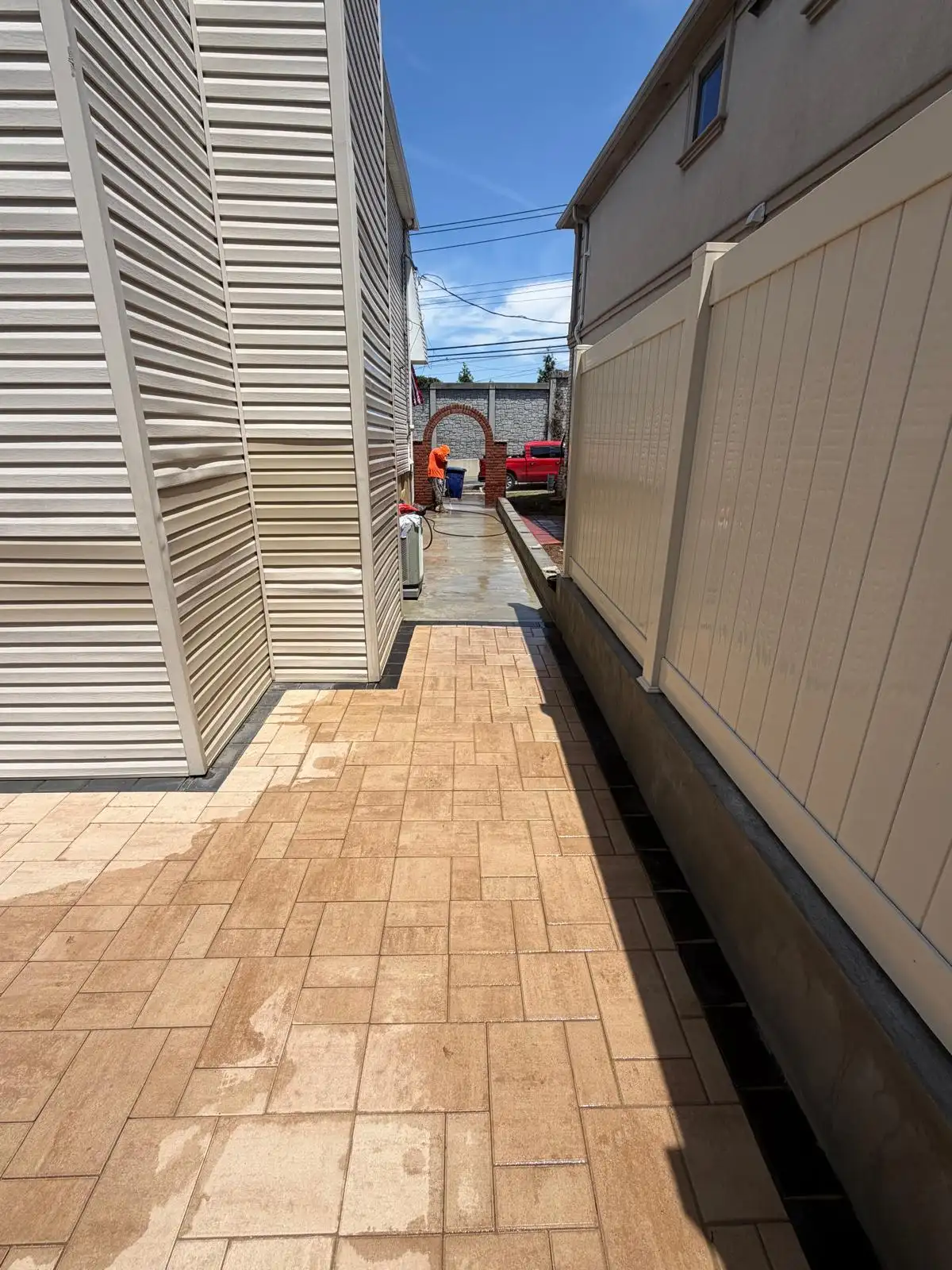 Paver walkway along PVC fence — Emerson Hill, Staten Island