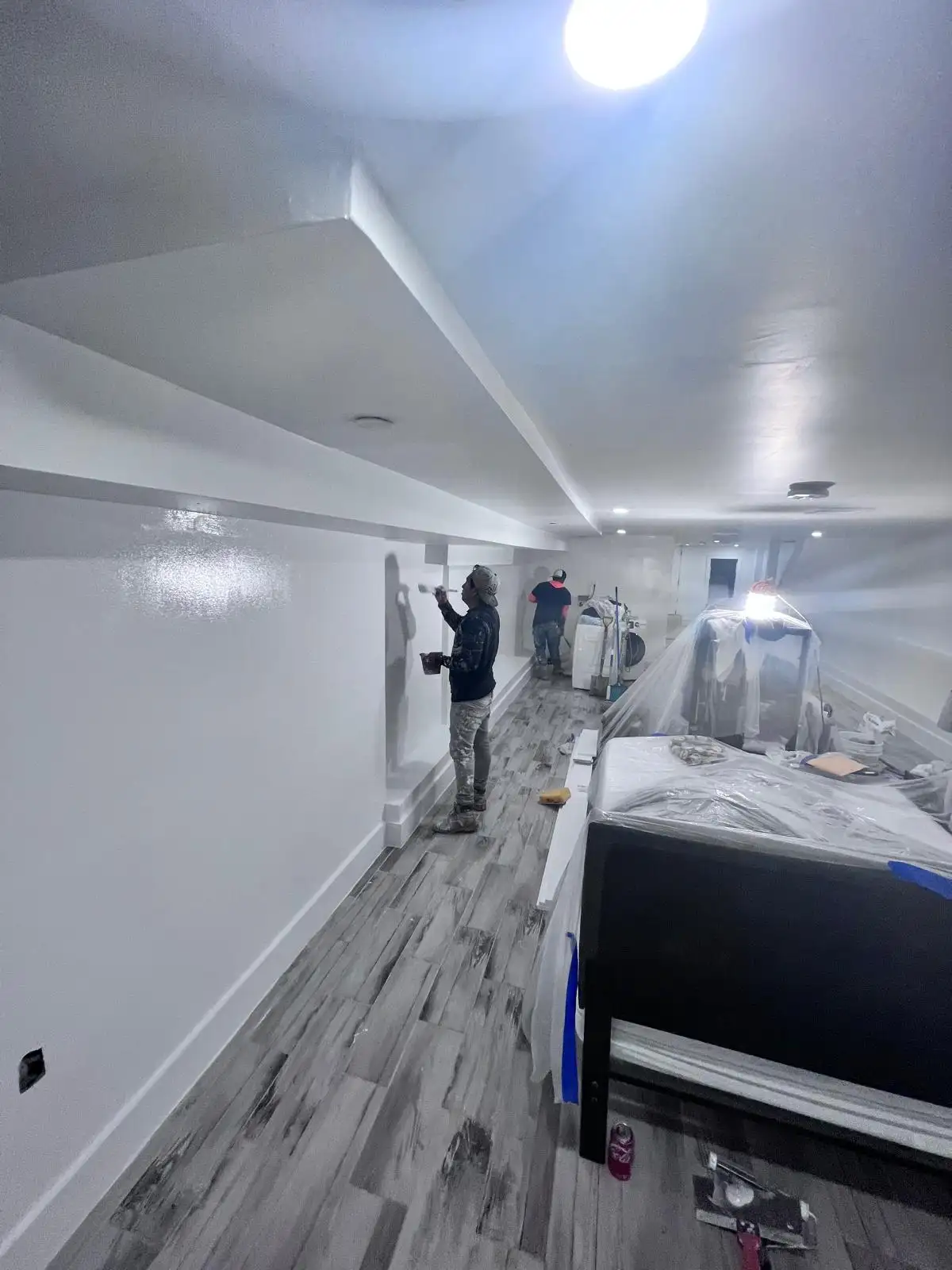 Plastering basement walls — Bedford-Stuyvesant, Brooklyn