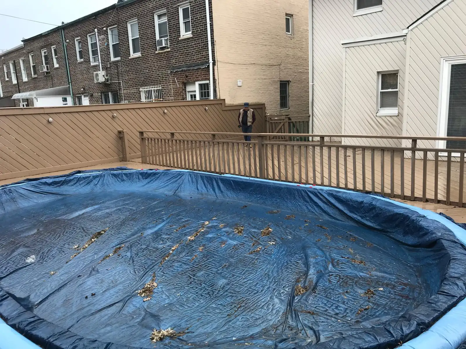 Pool cover before deck rebuild — Dyker Heights, Brooklyn