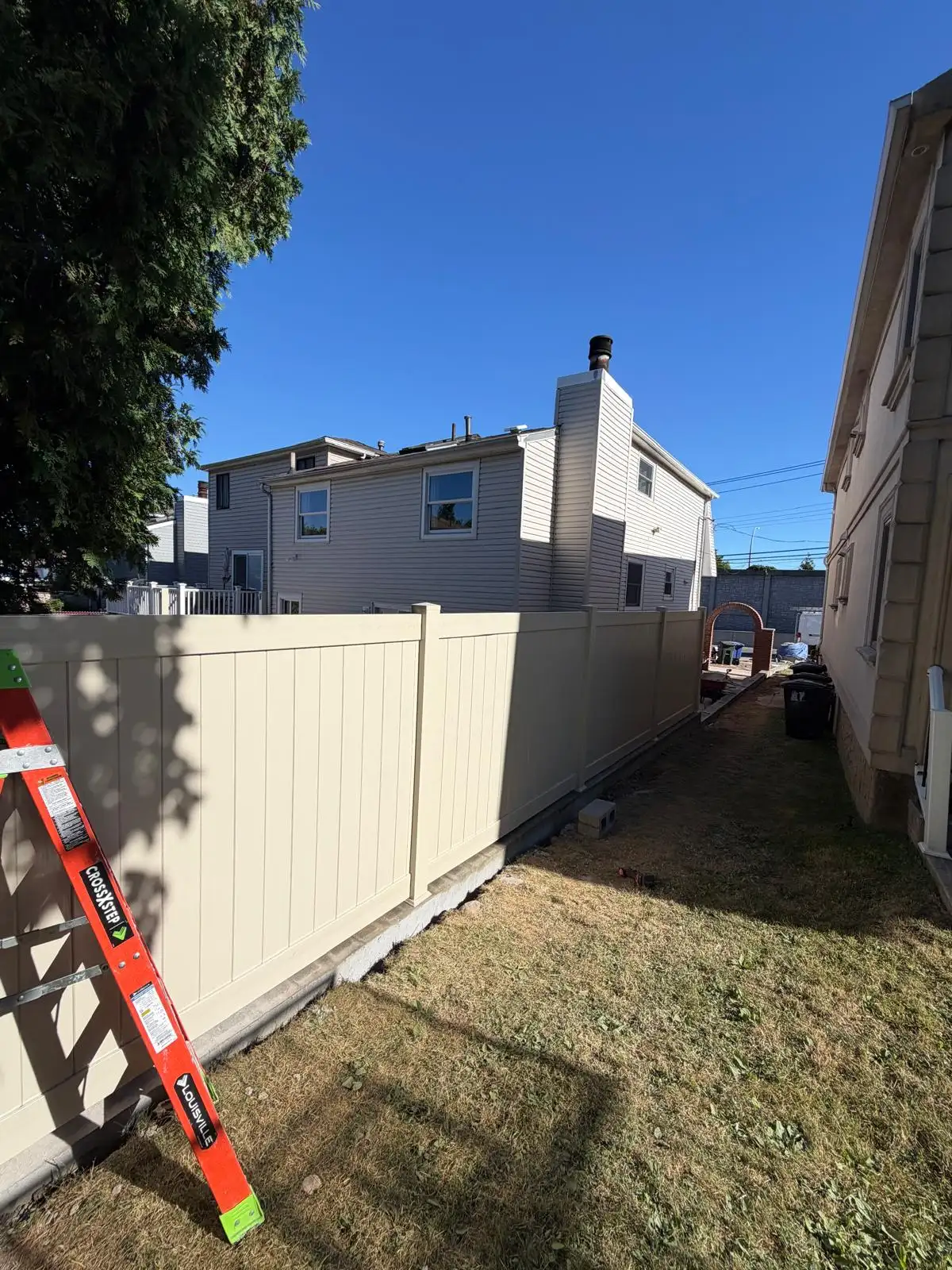 PVC fence on new retaining wall — Emerson Hill, Staten Island