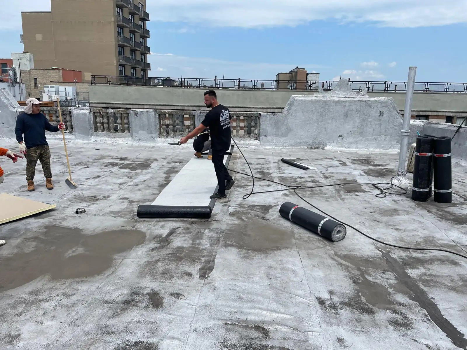 Roofers installing SBS membrane — Washington Heights, Manhattan