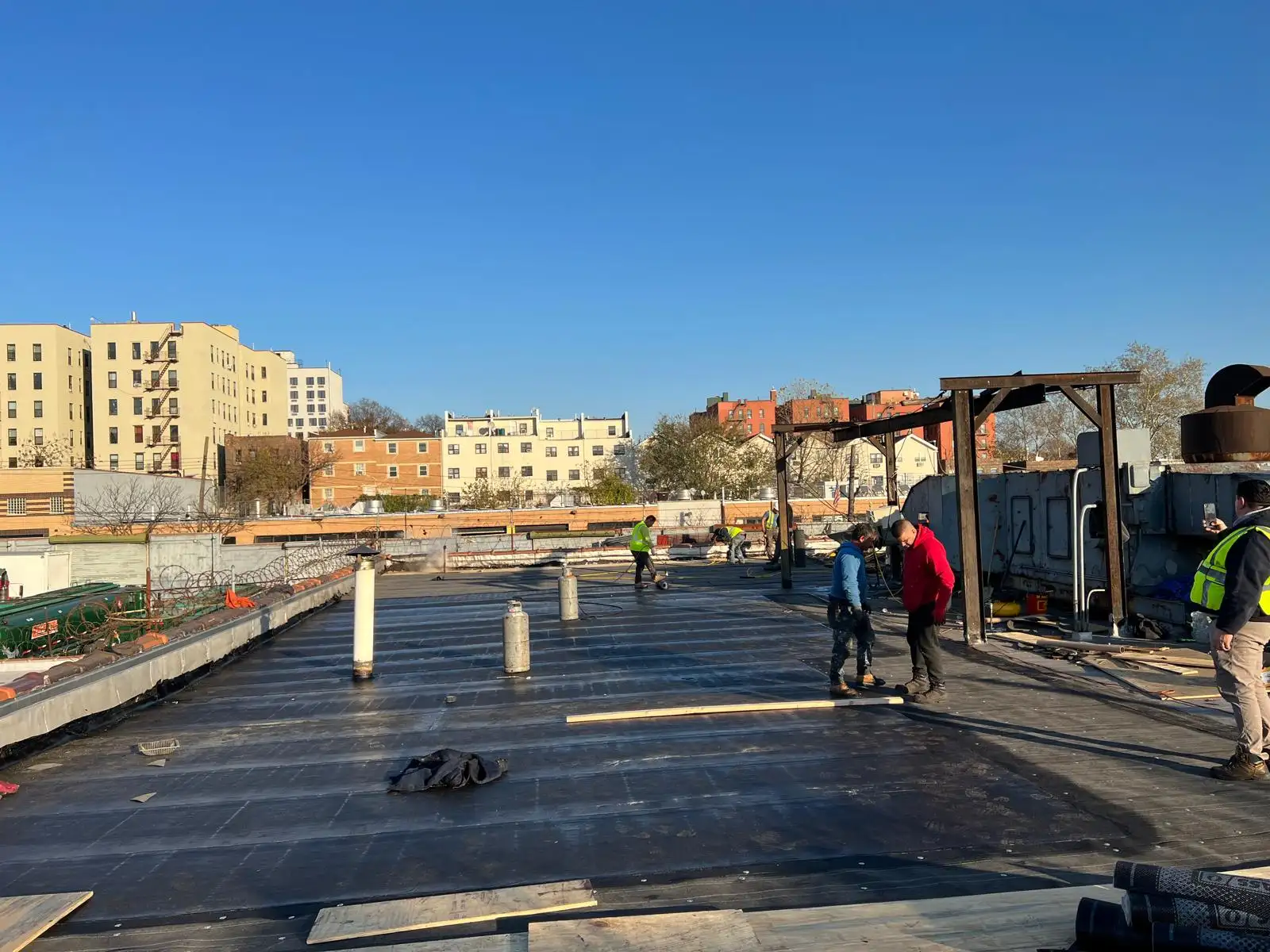 Roofers on new roof — Hunts Point, Bronx