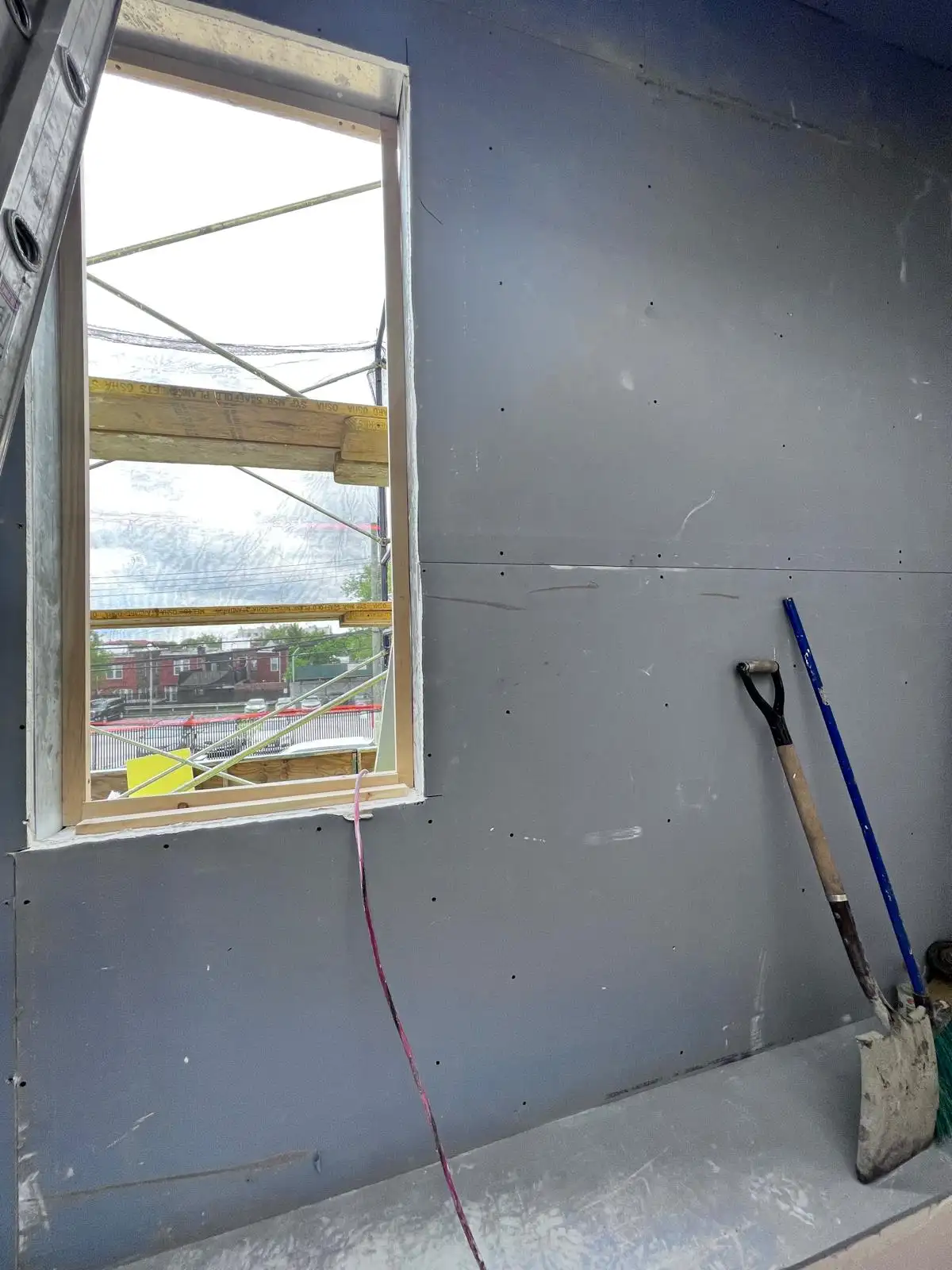 Sheetrock around new window — Crown Heights, Brooklyn