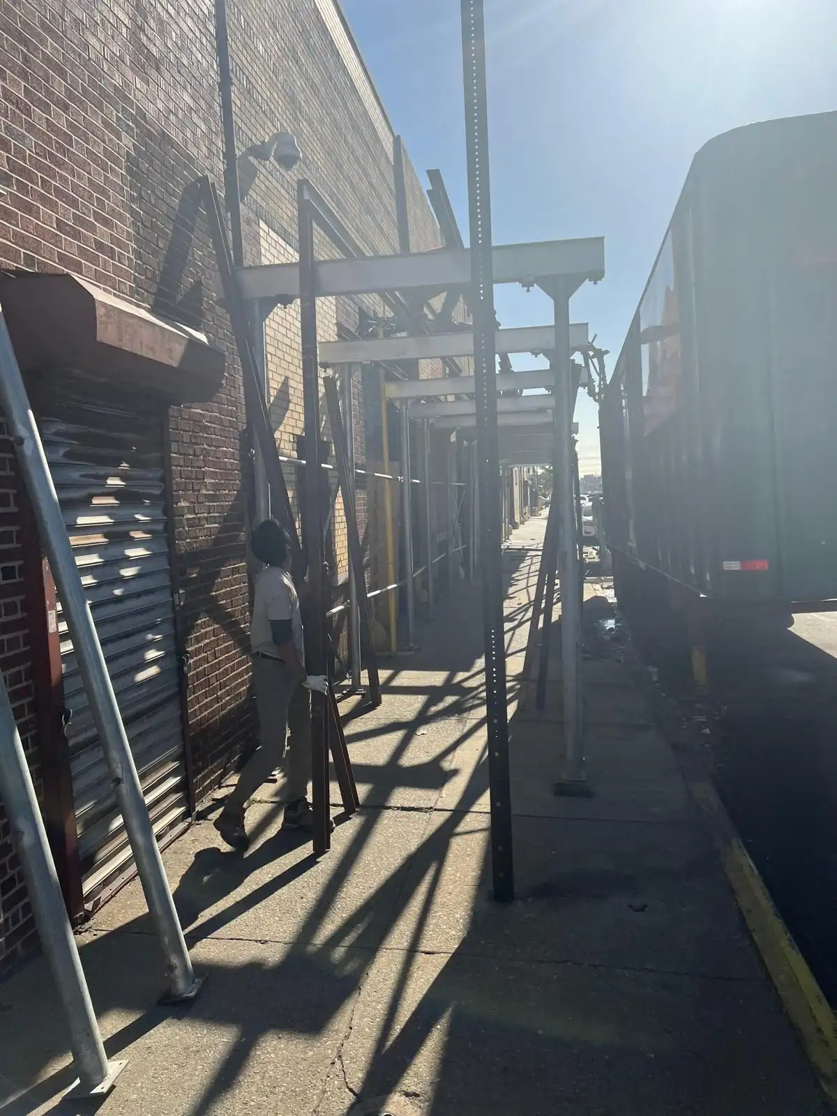 Sidewalk bridge and scaffolding — Hunts Point, Bronx