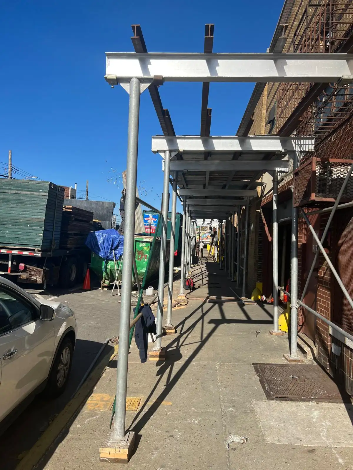 Sidewalk shed at factory entrance — Hunts Point, Bronx