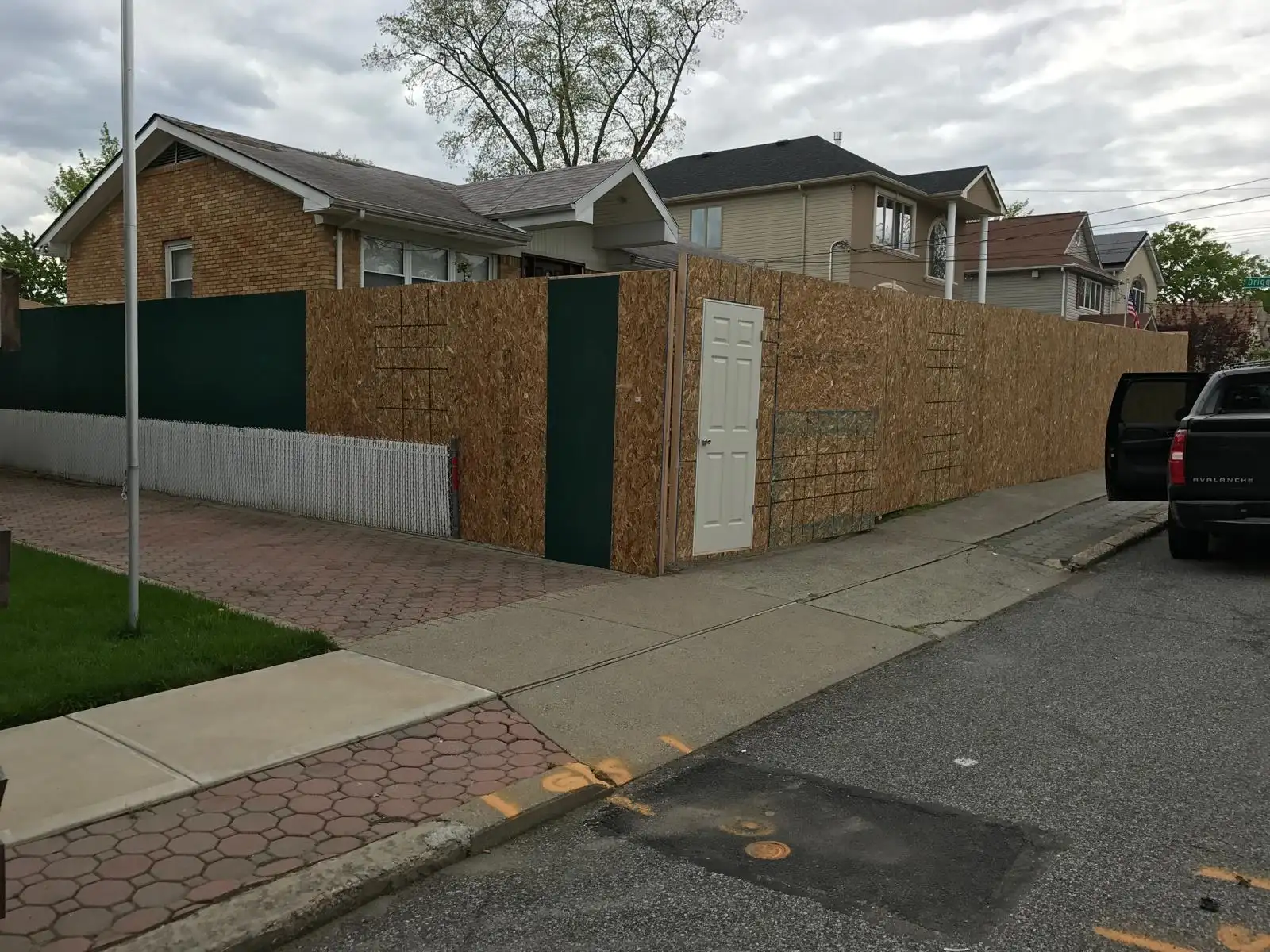 Site fence along sidewalk — Great Kills, Staten Island