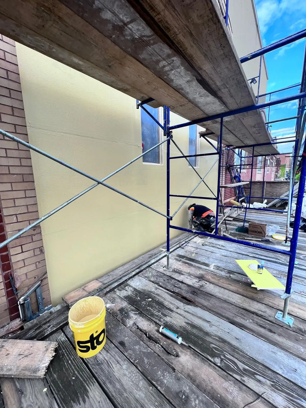 Stucco prep on new wall — Crown Heights, Brooklyn