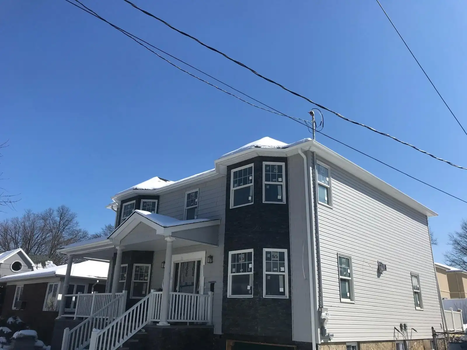 Two-story house with new siding — Castleton Corners, Staten Island