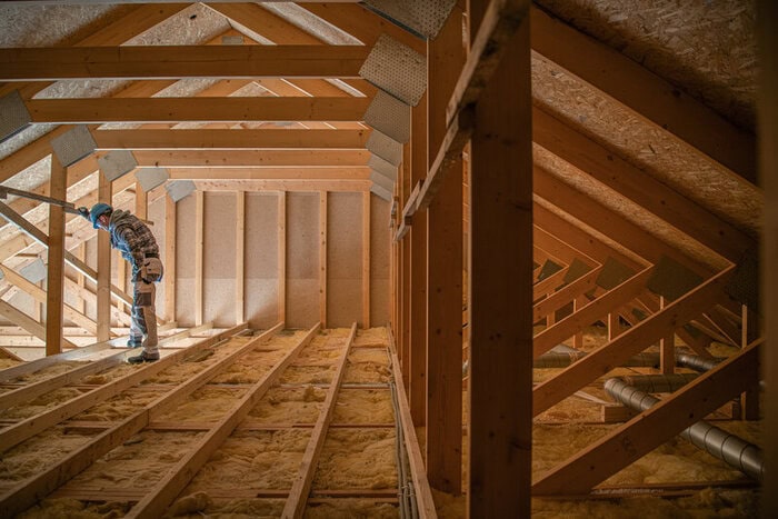 How Attic Insulation Impacts Roof Performance and Energy Bills